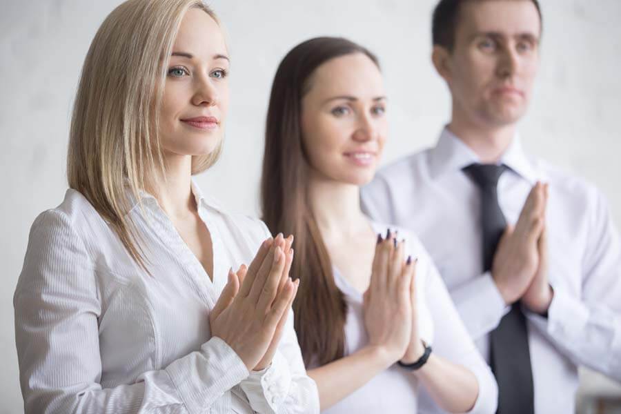 Business team meditating